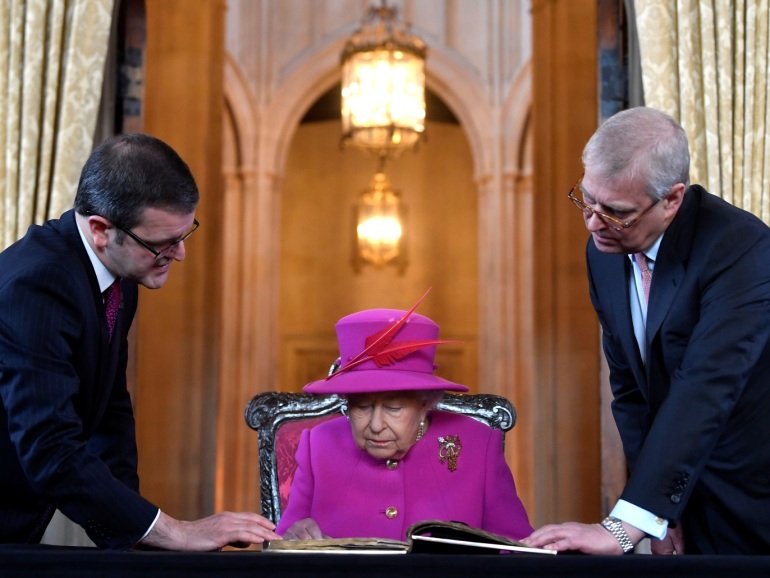 Britain's Queen Elizabeth, accompanied by Prince Andrew, visits The Honourable Society of Lincoln’s Inn to open the new Ashworth Centre, and re-open the recently renovated Great Hall, in London, Britain, December 13, 2018. REUTERS/Toby Melville