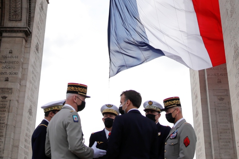 Ceremony to mark the end of World War II at the Arc de Triomphe in Paris