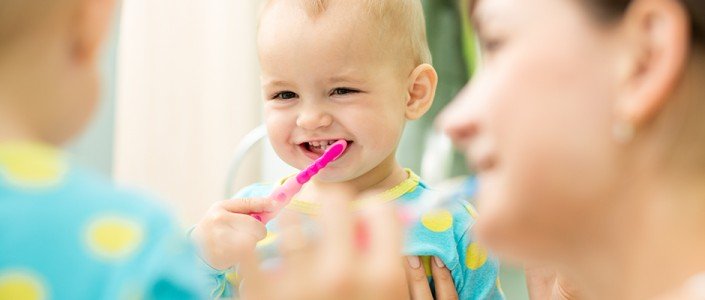 56c5a3157160farticle_3376_1-1 اطفالنا و العناية بأسنانهم