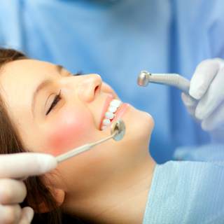 علاج الأسنان المفرط علاج الأسنان المفرط