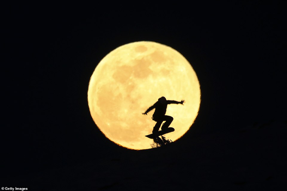 10011992-6724033-van_turkey_february_19_a_man_rides_a_snowboard_at_abali_ski_reso-a-2_1550649989688 A man rides a snowboard at Abali ski resort of Gevas district as supermoon is seen over Turkey. Supermoon is a full moon that almost coincides with the closest distance that the Moon reaches to Earth in its elliptic orbit, resulting in a larger-than-usual visible size of the lunar disk as seen from Earth