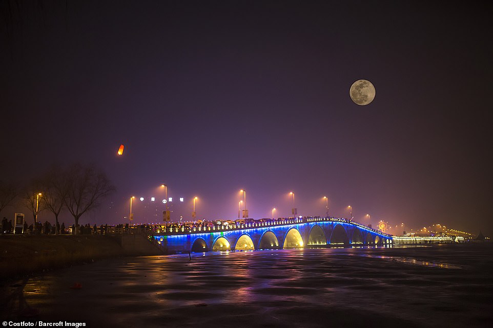 10036312-6724033-image-a-14_1550652730110 Seen from Shandong Province in China, where it coincided with the Lantern Festival, a Chinese festival celebrated on the fifteenth day of the first month in the lunisolar Chinese calendar