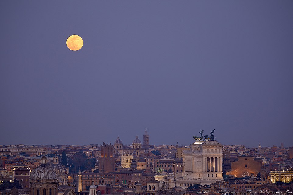 10039896-6724033-image-a-2_1550657352832 The moon is seen in the early hours of the morning above Rome. 'The February 2019 supermoon is special because it will be the largest full moon gracing our night skies until 2026,' said Emily Drabek-Maunder, astronomer at Royal Observatory Greenwich