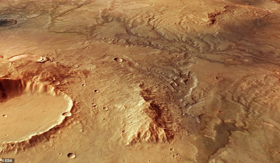 10272496-6743937-stunning_images_captured_by_the_european_space_agency_s_mars_exp-m-13_1551122003063 Stunning images captured by the European Space Agency’s Mars Express Satellite have revealed a glimpse into the red planet’s warm, watery past. The perspective view above illustrates an ancient river valley network on Mars