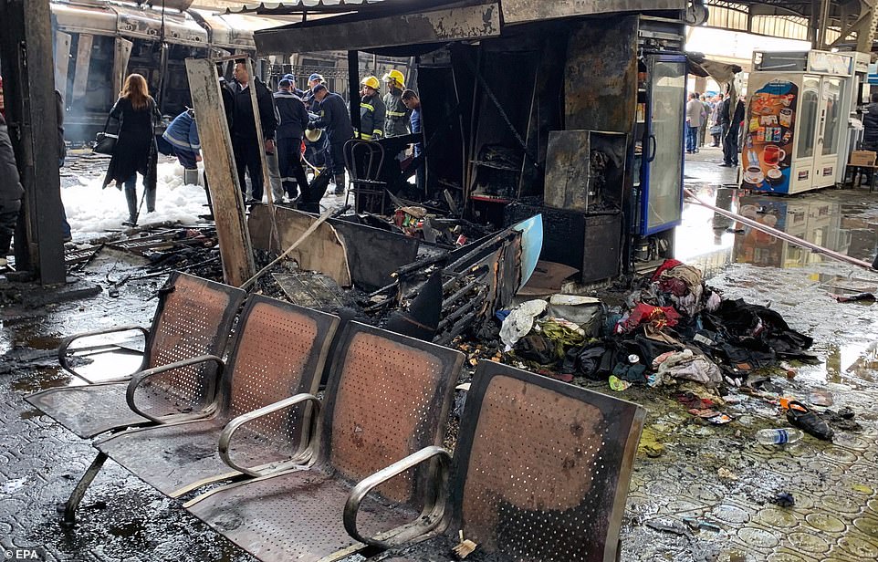 The platform opposite where the train was arriving sustained heavy damage in the blaze, with this shop completely torched