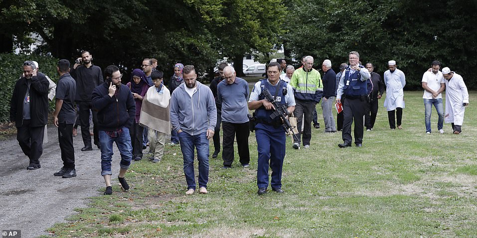 11025768-6815593-police_escort_distraught_witnesses_away_from_a_mosque_in_central-a-14_1552725008529 Police escort distraught witnesses away from a mosque in central Christchurch following the massacre. A 28-year-old man has been charged with murder