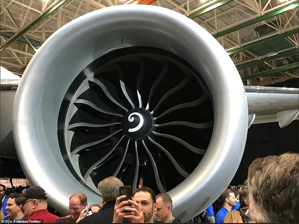 11029842-6813311-image-a-36_1552652398713 Staff were eager to snap pictures of the huge plane. It will make its maiden test flight in the spring