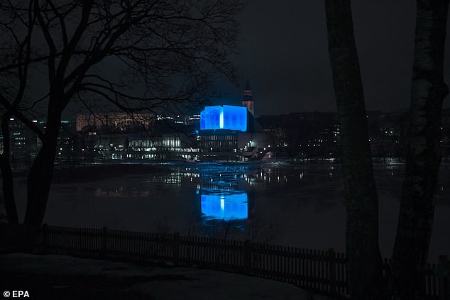 11064874-6816177-finland_s_congress_hall_shone_a_vivid_blue_to_commemorate_the_vi-a-4_1552747819304 Finland's congress hall shone a vivid blue to commemorate the victims, while the New Zealand flag still flies at half-mast in the country's capital of Wellington