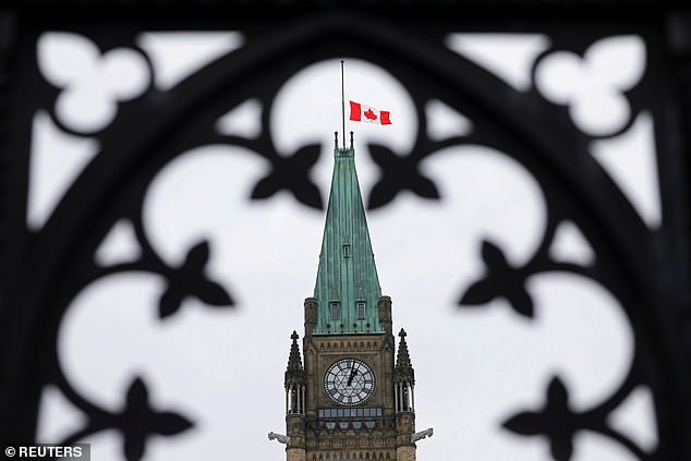 11064924-6816177-image-a-78_1552715943580 The Canadian flag flies at half-mast on the Peace Tower in memory of the victims of the mosque attacks in New Zealand