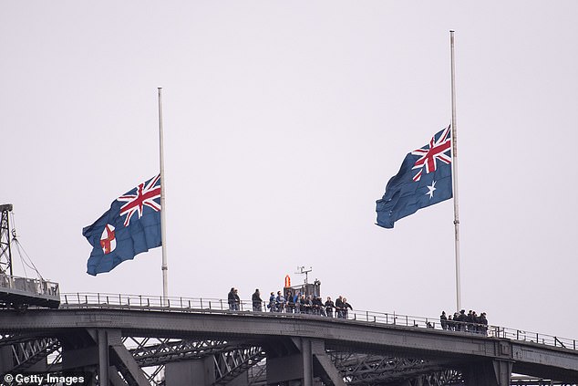 11065214-6816177-image-a-102_1552716488490 Flags fly at half mast on the Sydney Harbour Bridge