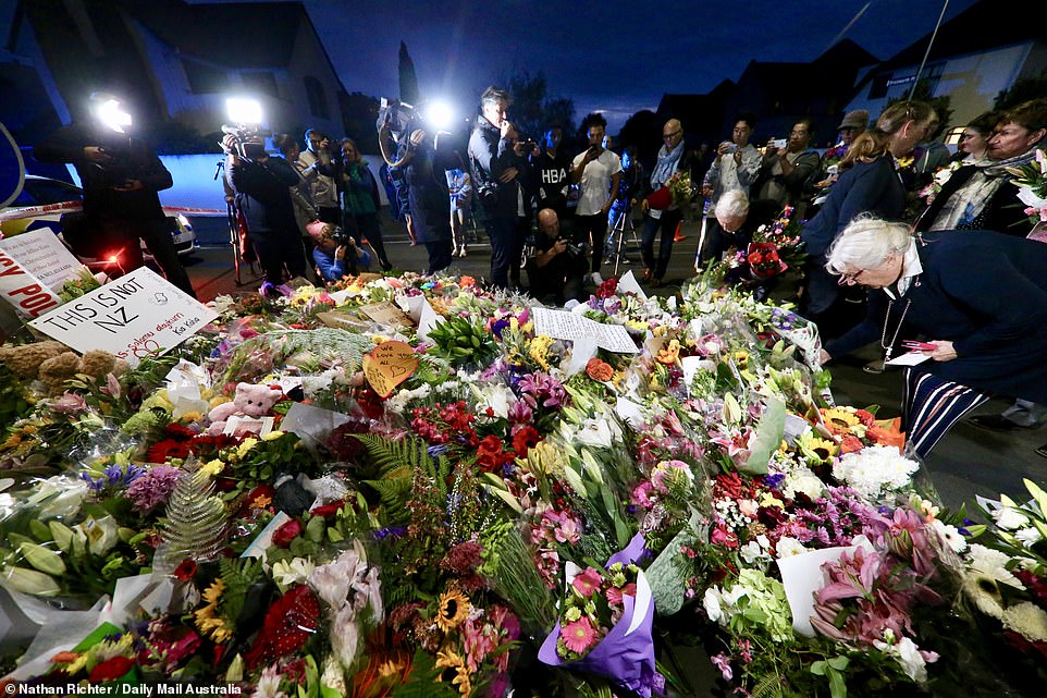 11067608-6816249-image-a-66_1552725788168 Hundreds of images flooded the internet of people attending mosques, laying flowers and paying their respects across New Zealand and Australia