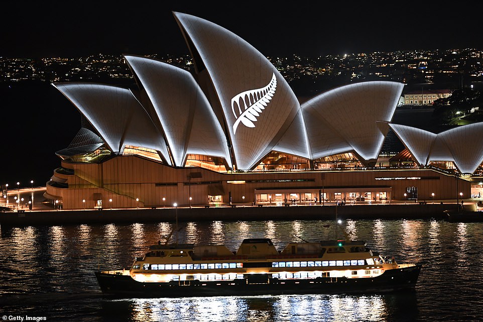 11069658-6816249-image-a-110_1552730332253 Standing in solidarity with Muslim communities world-wide, The Sydney Opera House was lit up with a silver fern of New Zealand on Saturday night
