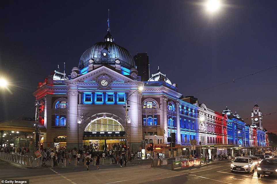 11072296-6816645-image-a-38_1552740622897 Melbourne's iconic Flinders Street Station was lit up in the colours of the New Zealand flag in a show of solidarity