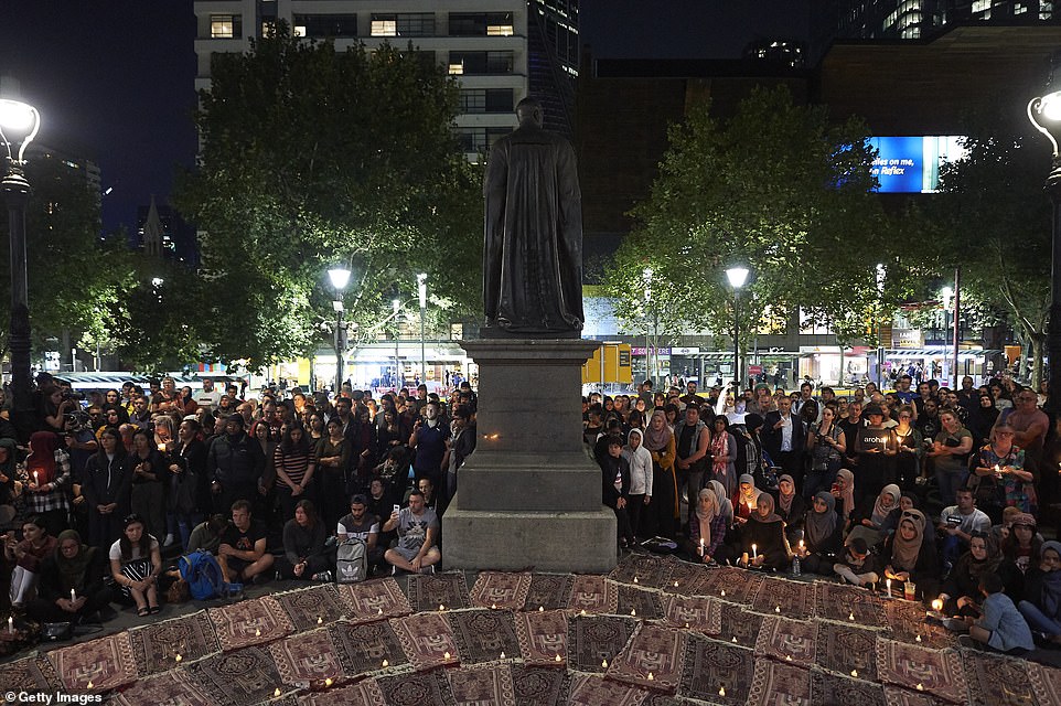 11072320-6816645-image-a-43_1552740641871 Forty-nine prayer mats were laid out on the steps of the State Library of Victoria, one for each victim killed in Christchurch