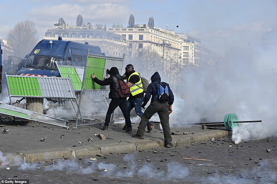11077830-6816815-paris_france_march_16_yellow_vests_gilets_jaunes_protesters_setu-a-94_1552752598929 Another barricade built by Yellow vests protesters during the demonstrations in Paris today