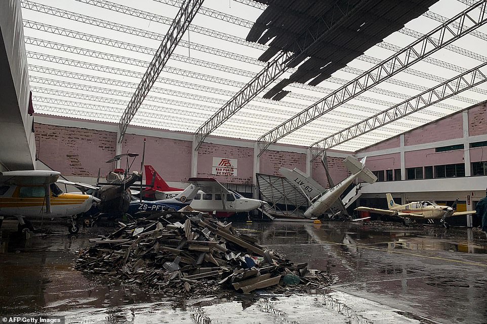 11142830-6822597-damage_at_the_airport_in_beira_in_the_aftermath_of_the_cyclone_h-a-7_1552931810490 Damage at the airport in Beira in the aftermath of the cyclone has caused the transport hub to close and cut the city off from the rest of the country