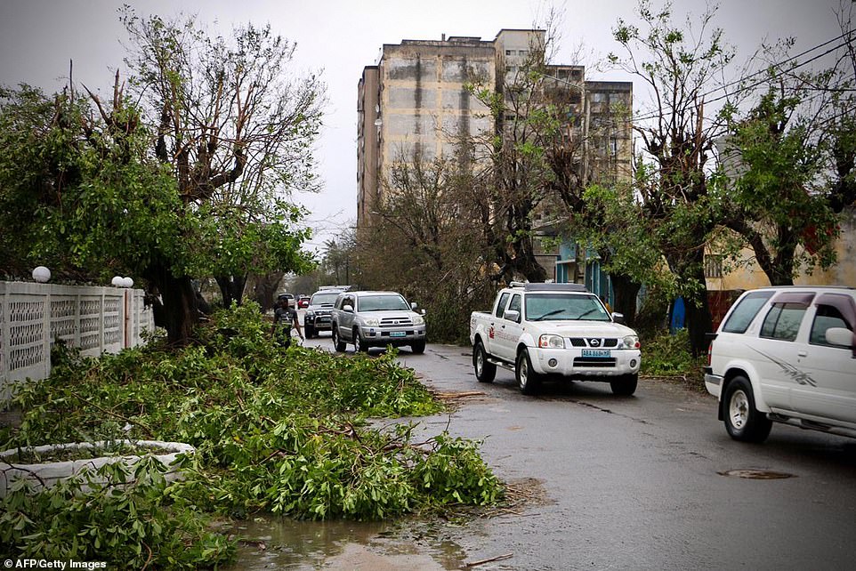 11142834-6822597-emergency_personnel_vehicles_driving_in_beira_mozambique_to_asse-a-12_1552931810494 Emergency personnel vehicles driving in Beira, Mozambique, to assess the extent of the damages after the devastation of the cyclone