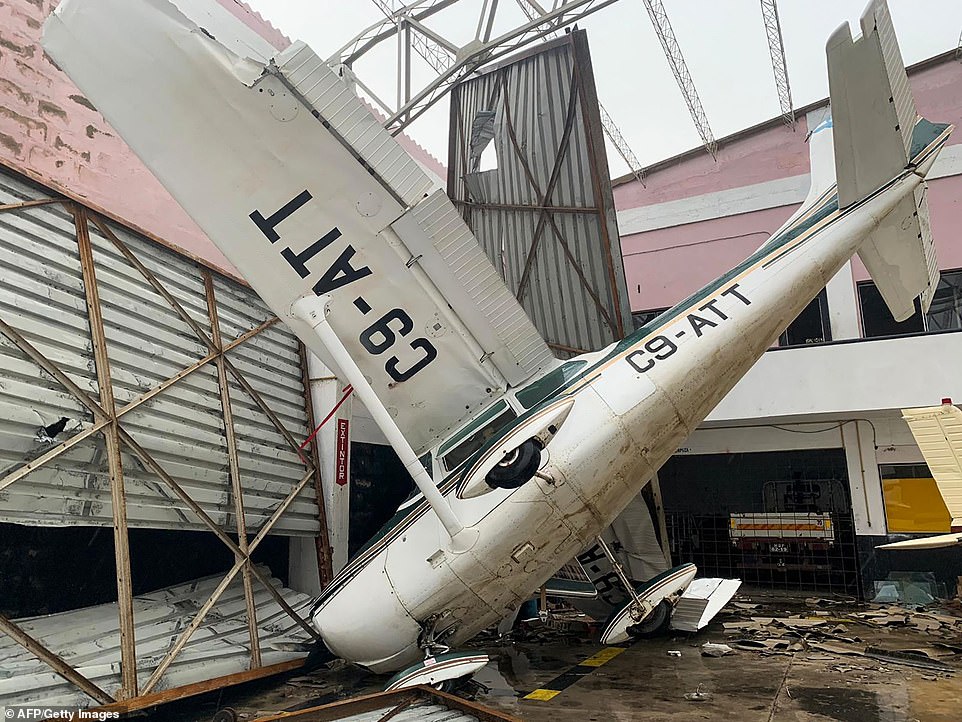 11142840-6822597-a_plane_lies_on_its_side_after_the_cyclone_swept_through_the_air-a-8_1552931810491 A plane lies on its side after the cyclone swept through the airport in Beira, Mozambique