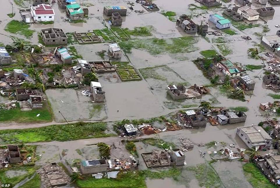 11142928-6822597-devastation_an_aerial_view_from_a_helicopter_shows_the_scale_of_-a-4_1552931810488 Devastation: An aerial view from a helicopter shows the scale of flooding in the port city of Beira. The Red Cross estimates that 90 per cent of the city has been damaged or destroyed