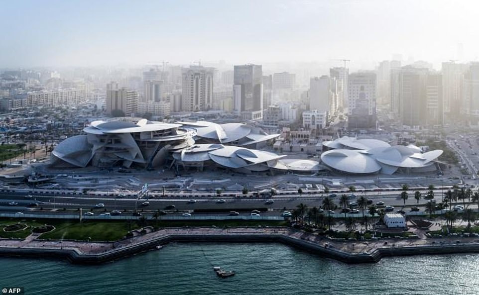 11412178-6846189-the_new_national_museum_of_qatar_which_was_designed_by_french_ar-a-3_1553762233861 The new National Museum of Qatar, which was designed by French architect Jean Nouvel, features a multi-curved flying saucer style roof