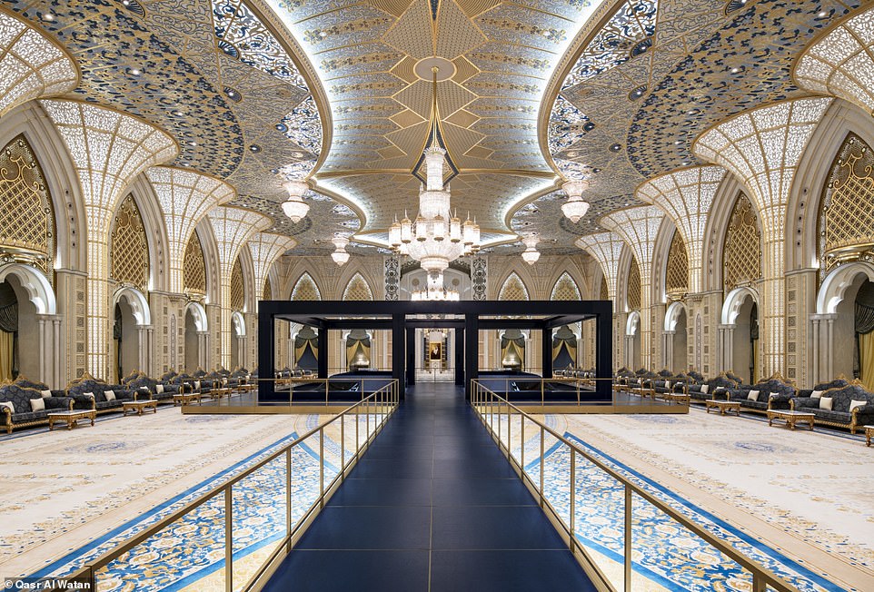 11433398-6835293-image-a-207_1553528723476 Dramatic chandeliers and beautiful carpets adorn the Al Barza part of Qasr Al Watan. In this part of the building, visitors can learn about the traditional role of a Majlis (which means council or assembly) through a multimedia show about Emirati leaders