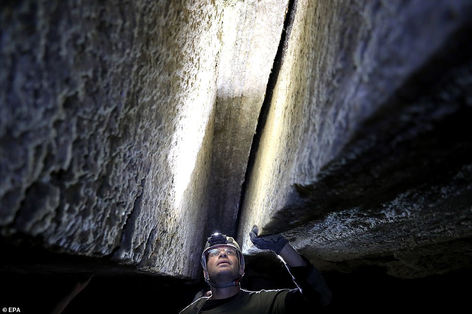 11569448-6858793-yoav_negev_chairman_of_the_israel_cave_explorers_club_explores_t-a-40_1553789897111 Yoav Negev, Chairman of the Israel Cave Explorers Club explores the Malham salt cave in Mount Sodom, Dead Sea. According to the Hebrew University, cavers from nine countries mapped Malham salt cave, which was first discovered in the 1980s