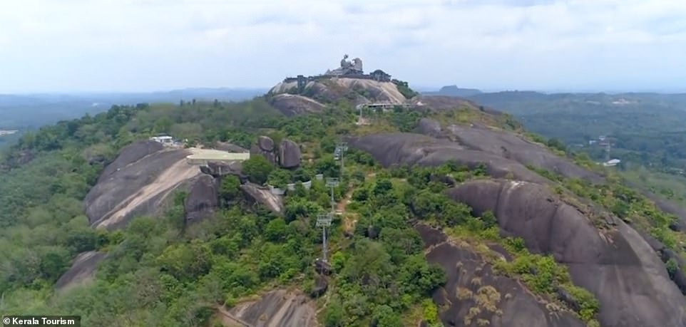 12603832-6947217-image-m-20_1556009238912 The giant sculpture can be reached via a winding footpath or by cable car. A helicopter service can also be arranged