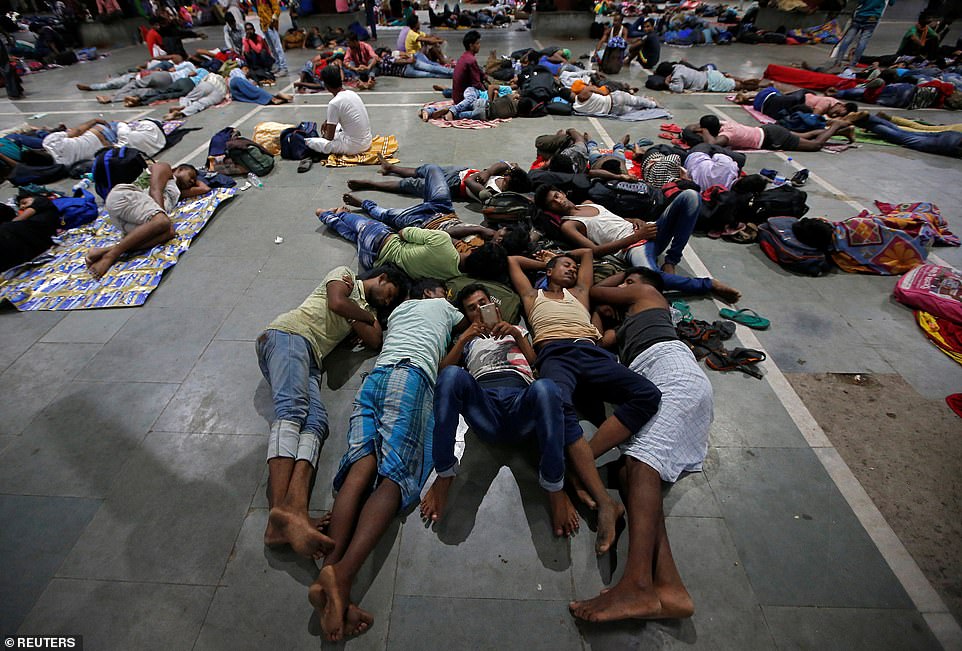 13045284-6988125-no_service_stranded_passengers_rest_inside_a_railway_station_aft-a-24_1556880886091 No service: Stranded passengers rest inside a railway station after trains between Kolkata and Odisha were cancelled ahead of Cyclone Fani
