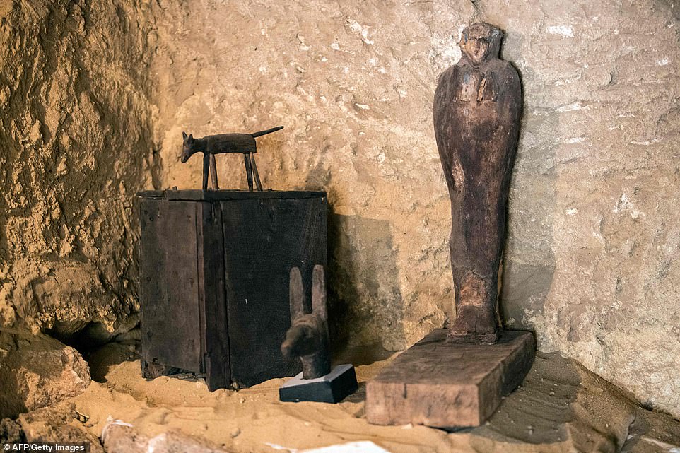 13086244-6992141-image-a-25_1556984510024 'Many artifacts were discovered in the tomb,' the ministry said, including limestone statues of one of the tomb's owners, his wife and son, as well as statues of what appear to be jackals