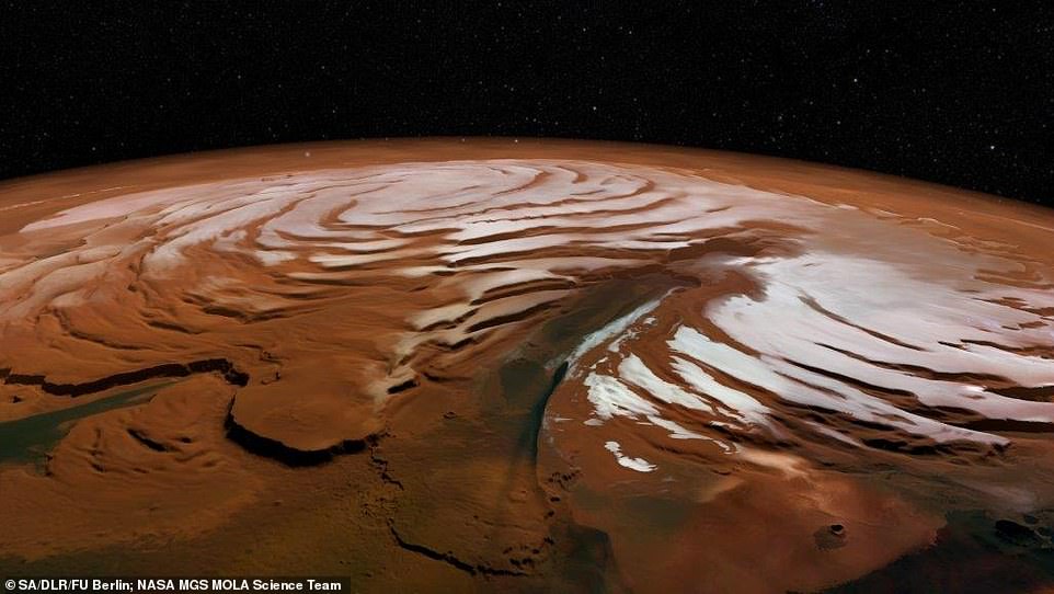 13865204-7063031-the_enormous_ice_caps_contain_enough_water_to_cover_the_planet_a-a-8_1558625430112 A giant deposit of water-ice buried within Mars' surface is evidence of a hidden polar ice cap, scientists say in a new study. The enormous ice caps contain enough water to cover the planet and are likely one of the biggest water reservoirs there