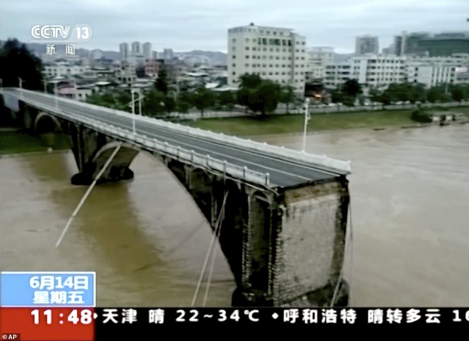 14789920-7142225-image-a-7_1560521662723 Two people remain missing and one has been saved as rescuers are still looking for survivors of the shocking incident