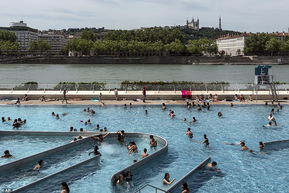 15235564-7178557-people_visit_a_swimming_pool_in_the_center_of_lyon_central_franc-a-135_1561491059100 People visit a swimming pool in the center of Lyon, central France
