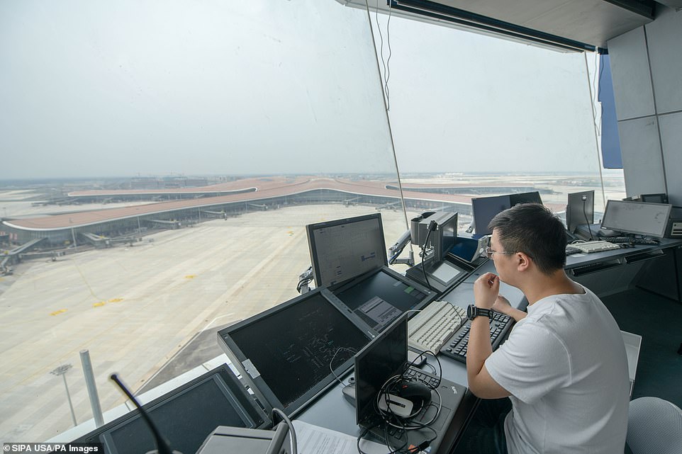 15278192-7183251-image-a-4_1561552980486 A 1,345-square-foot command centre perches at the top of the control tower which will be responsible for handling at least 70 per cent of the airport's traffic. With seven runways in plan, the hub occupies a piece of land four-fifth the size of Manhattan