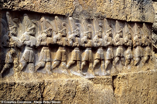 15380844-7193101-image-a-86_1561740988050-2 A mysterious series of Bronze Age carvings — depicting three processions of gods walking towards two supreme deities — may have been a most surprising calendar