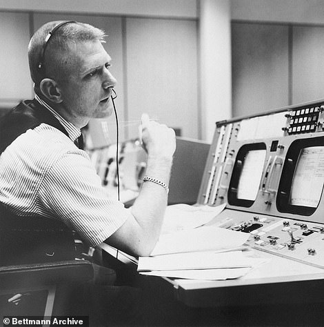 15390510-7191309-image-m-32_1561748957591 Mission Control began juggling its shift schedules to swing its key flight director teams into action for the lunar landing 50 years ago. Eugene F. Kranz, sitting in front of his control board