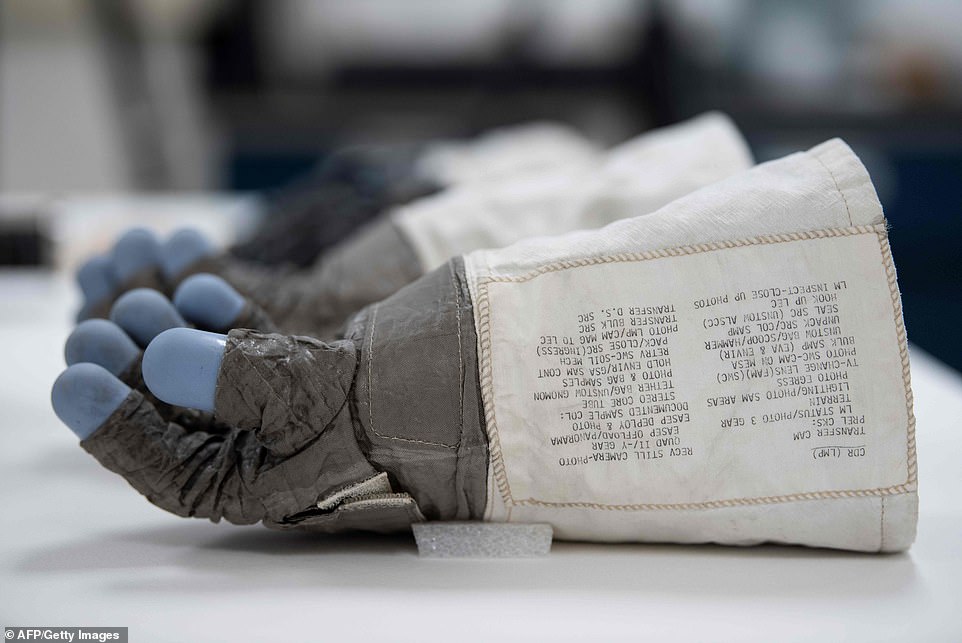 15399220-7191309-lunar_mission_apollo_11_commander_neil_armstrong_s_gloves_are_se-a-114_1561767947896 Lunar Mission Apollo 11 Commander Neil Armstrong's gloves seen inside the Conservation Laboratory of the Air and Space Museum in Chantilly, near Washington. Next month, on July 20, 2019, will mark 50 years since Commander Neil Armstrong's first step on the moon and the famous phrase 'That's one small step for man, one giant leap for mankind.'