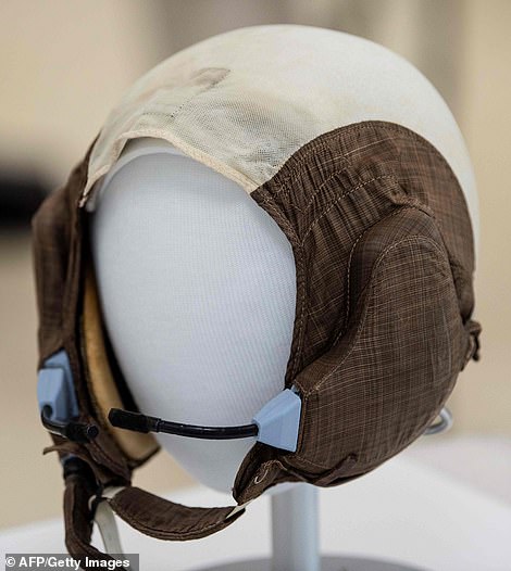 15399222-7191309-image-m-112_1561767931597 Lunar Module Pilot Buzz Aldrin's 'Snoopy cap' seen inside the Conservation Laboratory of the Air and Space Museum, next month will mark 50 years on from the Lunar Mission Apollo 11 moon-landing