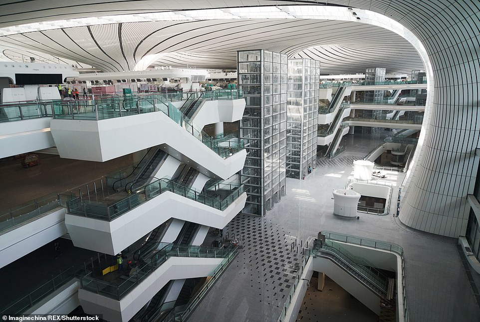 15479756-7200627-image-m-205_1561987133489 The construction of Beijing Daxing International Airport comes as the country is witnessing a fast growth in its civil aviation industry. China is expected to overtake the United States as the world's largest aviation market in the mid-2020s