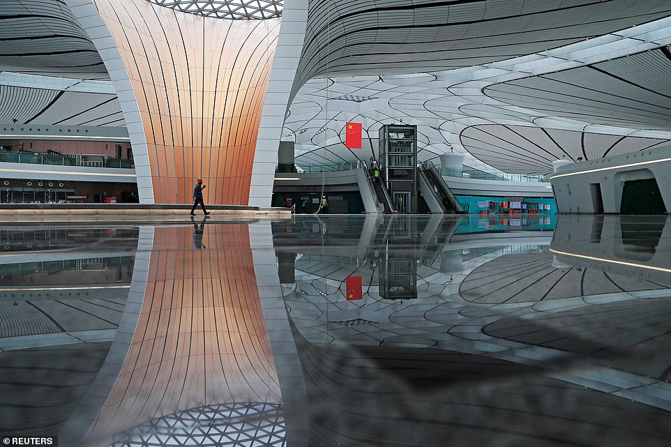 15479804-7200627-image-a-157_1561986720270 Located 46 kilometres south of Tiananmen square, the new airport will operate at full capacity in 2025, with four runways and the potential to receive 72 million passengers per year