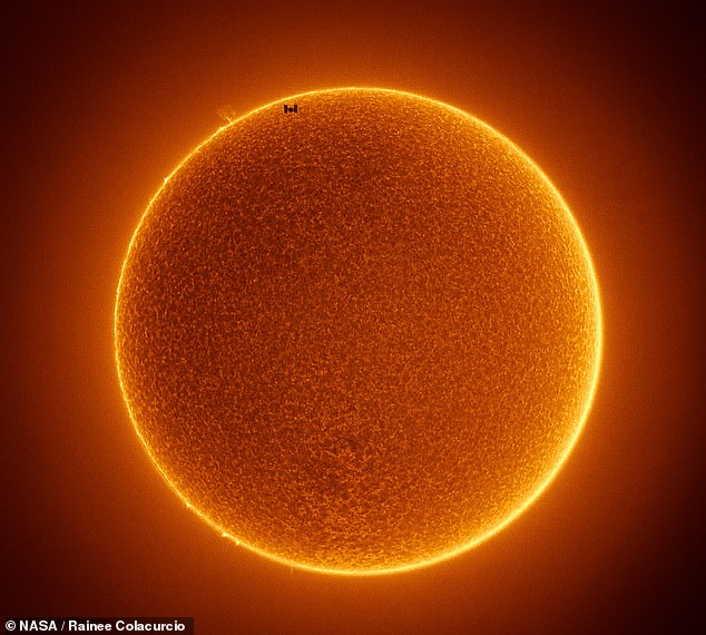 16106560-7252043-image-a-9_1563269717140 Is it a bird? Is it a sunspot? No, it's the International Space Station caught in a stunning photo as it passed directly between the Earth and the sun