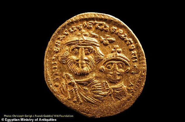 16443474-7281435-image-a-51_1563977017432 Egyptian and European researchers spent two months probing the remains of Heracleion and Canopus off the coast of the Nile Delta, Egypt's Ministry of Antiquities reported and found the coins (pictured) on boats