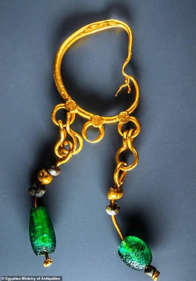 16443480-7281435-image-a-52_1563977141613 The city slumped into the sea some 1,200 years ago but since its discovery in 2000 marine archaeologists have been probing to uncover new parts of the settlements.. Ancient columns, 2,000-year-old pottery and bronze coins as well as this stunningly preserved necklace, here