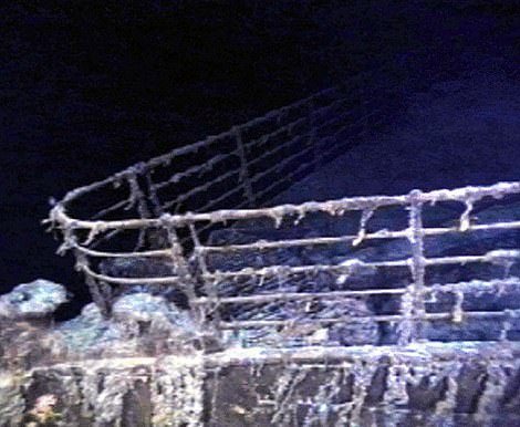 17541740-7379953-image-a-42_1566422210015 The port bow railing of the RMS Titanic lies in 12,600 feet of water about 400 miles east of Nova Scotia as photographed August 10, 1996
