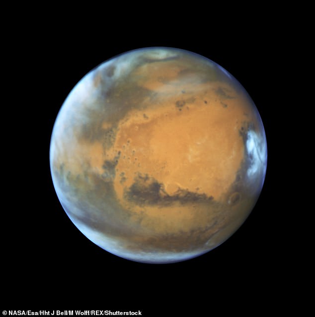 18099102-7430601-image-m-8_1567675098896 Focus: Over the years, scientists have found evidence of water, chemical reactions, and expansive ice lakes beneath the surface of Mars