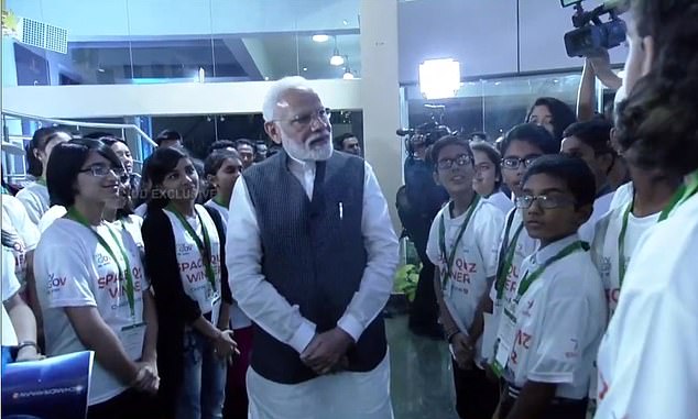 18171974-7435649-image-a-19_1567806174698 India's Prime Minister Modi comforted students who were involved with the ground-breaking mission after confirmation that signal had been lost