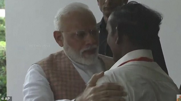 18183496-7435649-image-a-5_1567845411614 Indian Prime Minister Narendra Modi embraces and consoles visibly heart-broken ISRO Chairman