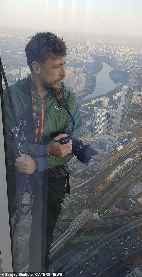 18337148-7451443-shakuto_an_action_sports_photographer_takes_pictures_while_hundr-a-7_1568218357491 Shakuto, an action sports photographer, takes pictures while hundreds of feet above the ground in Moscow