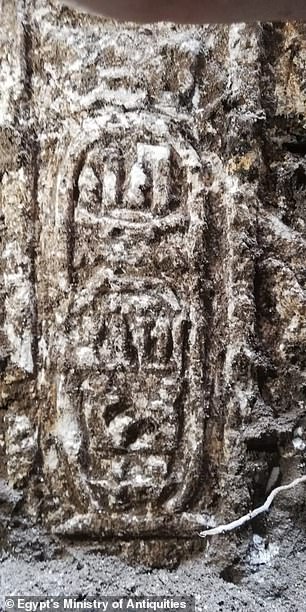 19272710-7535487-image-a-58_1570139010958 The team has uncovered an east-west wall, a north-south wall and the southwestern corner of the temple, which is adorned with carvings of the Egyptian god Hapi --with text mentioning Ptolemy IV
