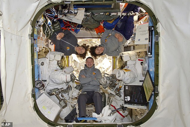 19892126-7588111-image-a-58_1571414136491 This photo provided by NASA shows astronauts Andrew Morgan with Christina Koch and Jessica Meir at the International Space Station on Friday, Oct. 18, 2019