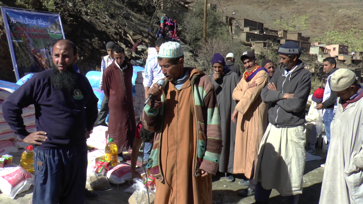 بالصور.. حملة إدخال السرور توزع المواد الغذائية على دواري اغرم وايت كطوف إقليم شيشاوة